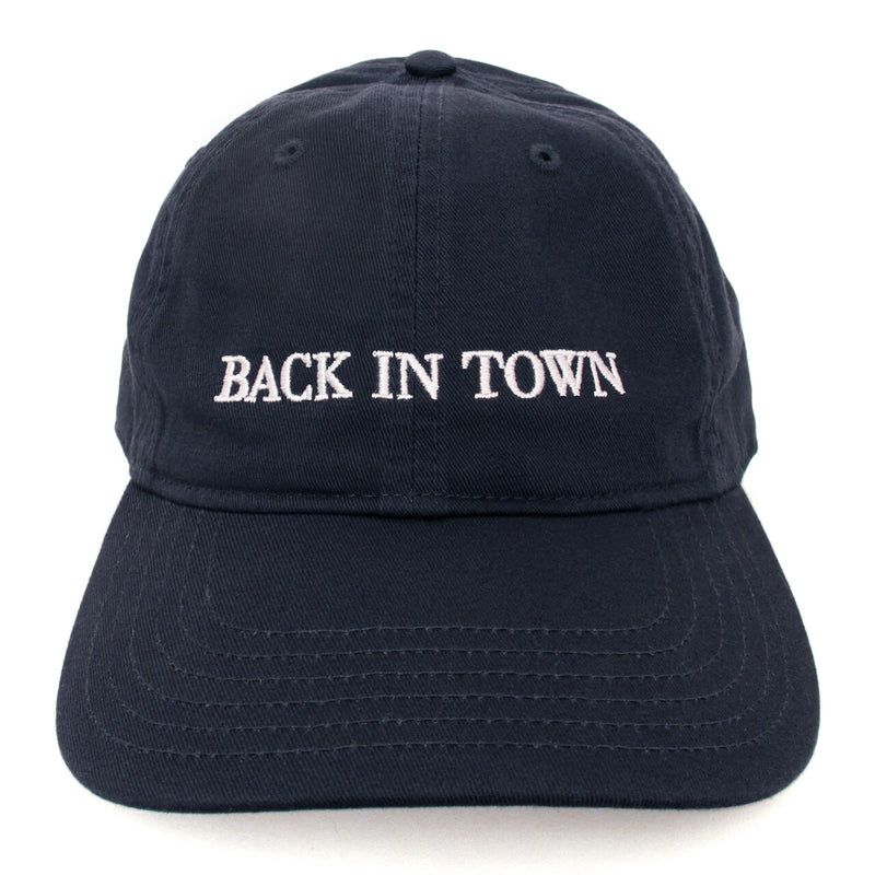 Back in town hat